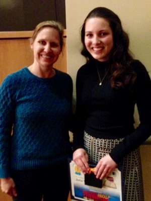 Julia Tofan, who won first place for Level III in Connecticut's Letters About Literature contest, is congratulated by Wendy Glenn, coordinator of the Connecticut contest. (Photo courtesy of RHAM High School)
