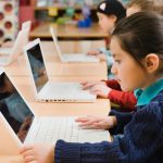 Schoolchildren using computers