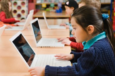 Schoolchildren using computers