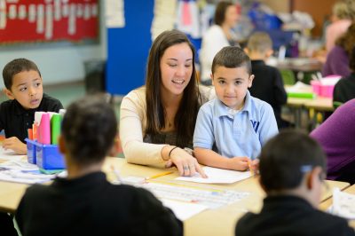 Kimberly Sakamoto student teaching in kindergarten classroom. According to Cyr, Short-term or immediate impact of preschool is evident as students enter kindergarten.