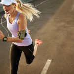 Athlete running with wearable device (iStock image)