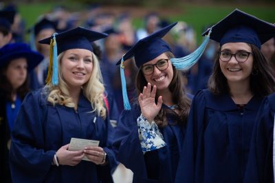 Neag School Class of 2018 graduates walk together to the Undergraduate Commencement ceremony on May 6, 2018. (Photo credit: Cat Boyce/Neag School)