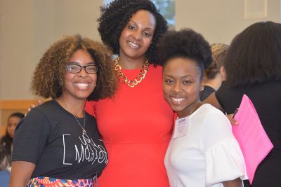 Alumna Tracey-Ann Lafayette, left; Mia Hines, academic advisor in the Neag School, center; and alumna Symone James attend the Neag School’s 2018 Celebration of Diversity in Education Dinner. (Shawn Kornegay/Neag School)