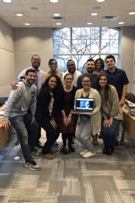 Graduate students in counselor education, including Lorenzo Chavez Jasmine Morel, Amanda Perrault, Katrina Zaciek, and Emily Sears, along with assistant professor Erik Hines, Melanie Banks, Johnny Banks, Tyler Burley, Kimberly Traverso, and Aaron Gilberto, gathered at UConn’s School of Social Work in February to recognize National School Counseling Week. (Photo courtesy of Erik Hines)