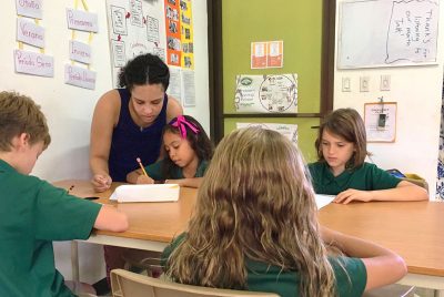 Kiana Foster-Mauro works with students at La Paz Community School