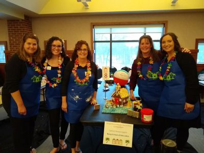 Neag School staff took part as the Spiked NeagNoggers in the annual UConn Gingerbread House Competition on the Storrs campus.