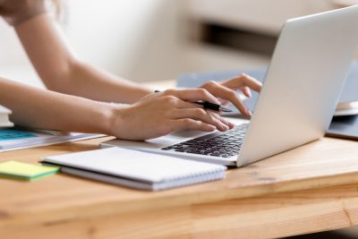 Student with laptop.