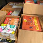 Books boxed up to be distributed through summer reading program.