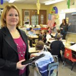 Sandra Chafouleas hold booking in classroom.