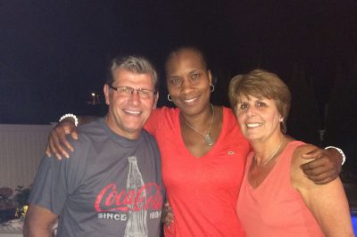 Geno Auriemma, Jamelle Elliott, and Kathy Auriemma.