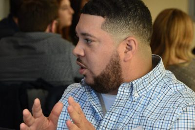 Class of 2021 senior Daniel Tavares explains a topic during Neag School's curriculum conference.