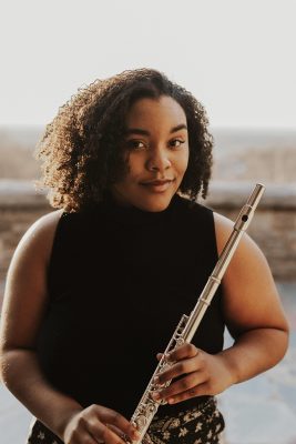 Brianna Chance holding flute.