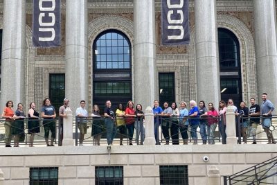 Group of adults in front of UConn Hartford building.